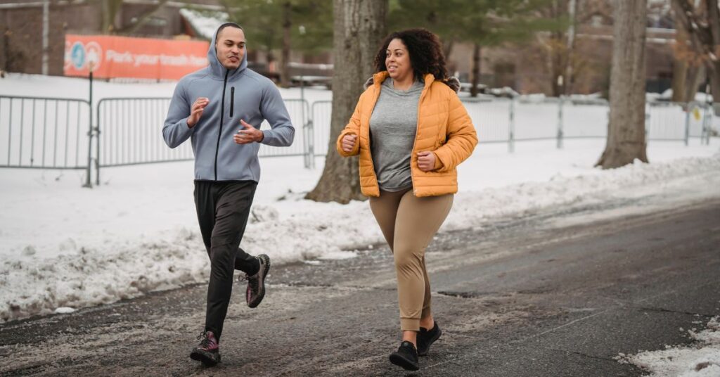 Larger woman runs with fit man to achieve weight loss