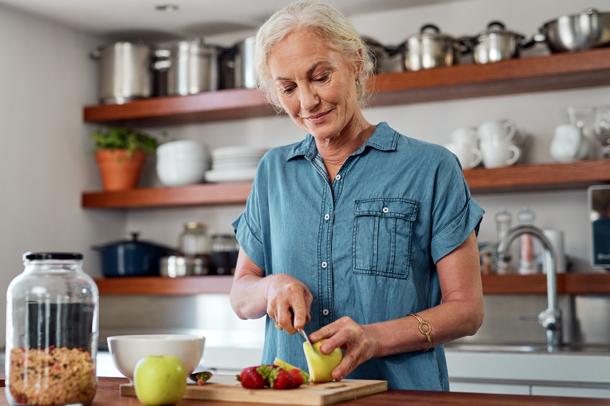 woman preparing a healthy snack for long term weight loss without semaglutide