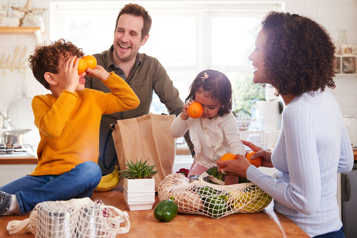 family unpacking groceries full of fiber