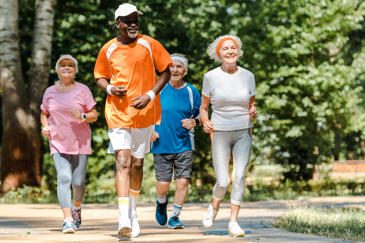 group of active seniors out for a run in the sunshine