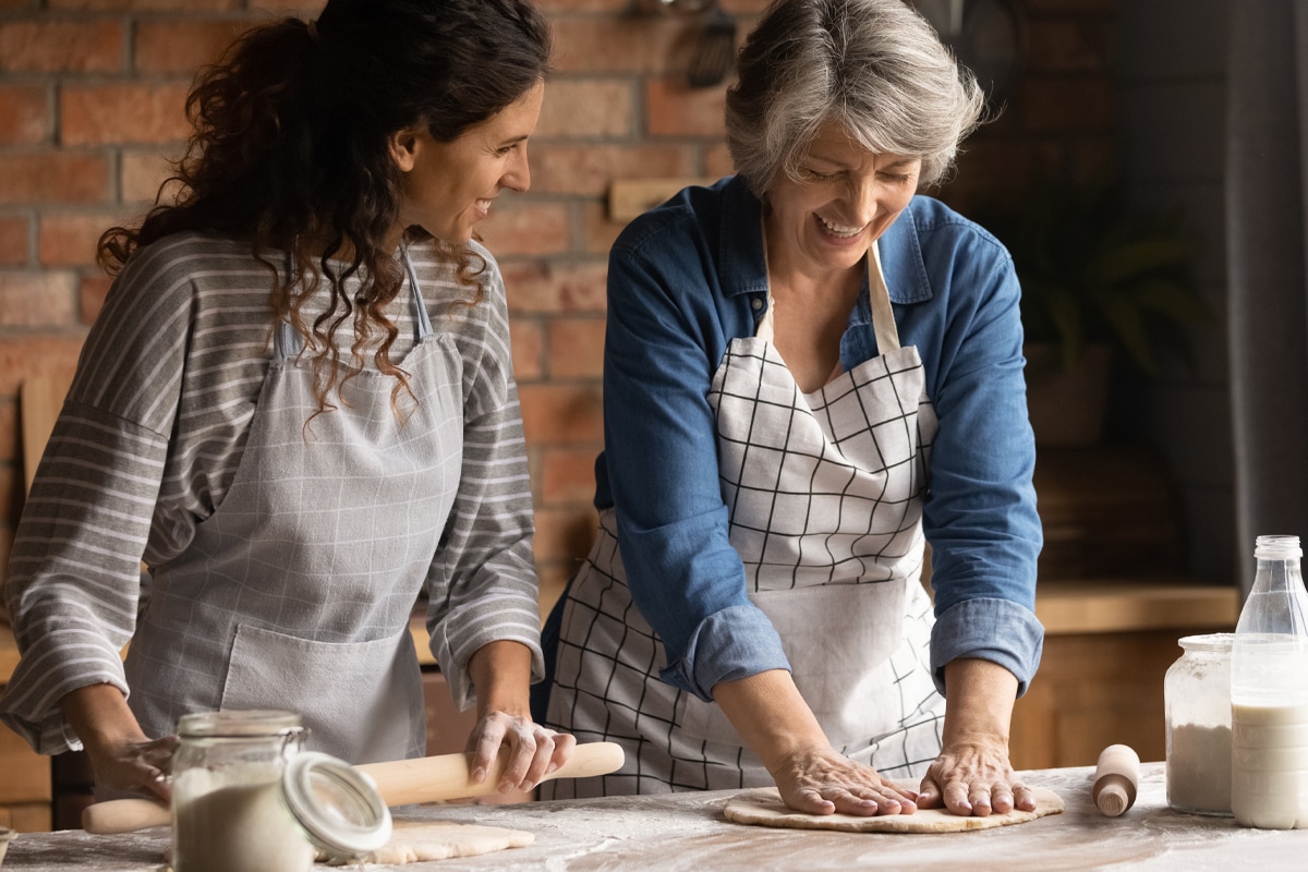 mother and daughter baking together