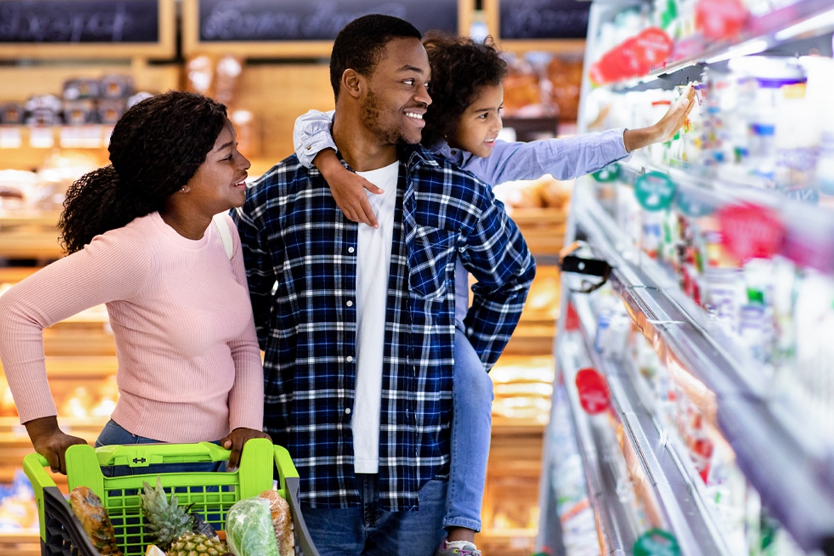 family shopping for groceries together